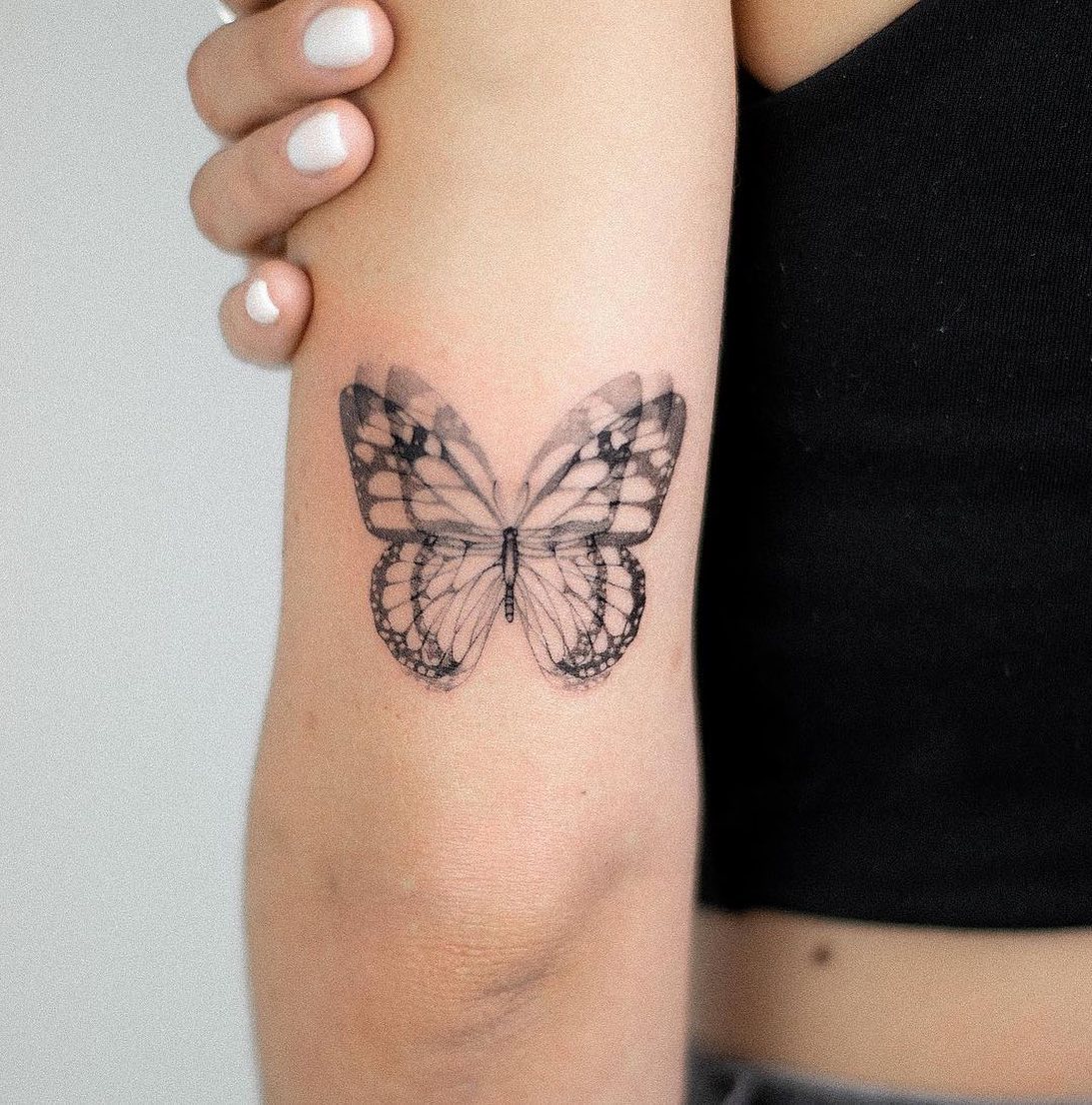 Impresión de tatuaje de mariposa